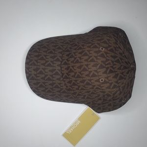 adjustable cap with magic closure.  one size, brown MK. Unisex